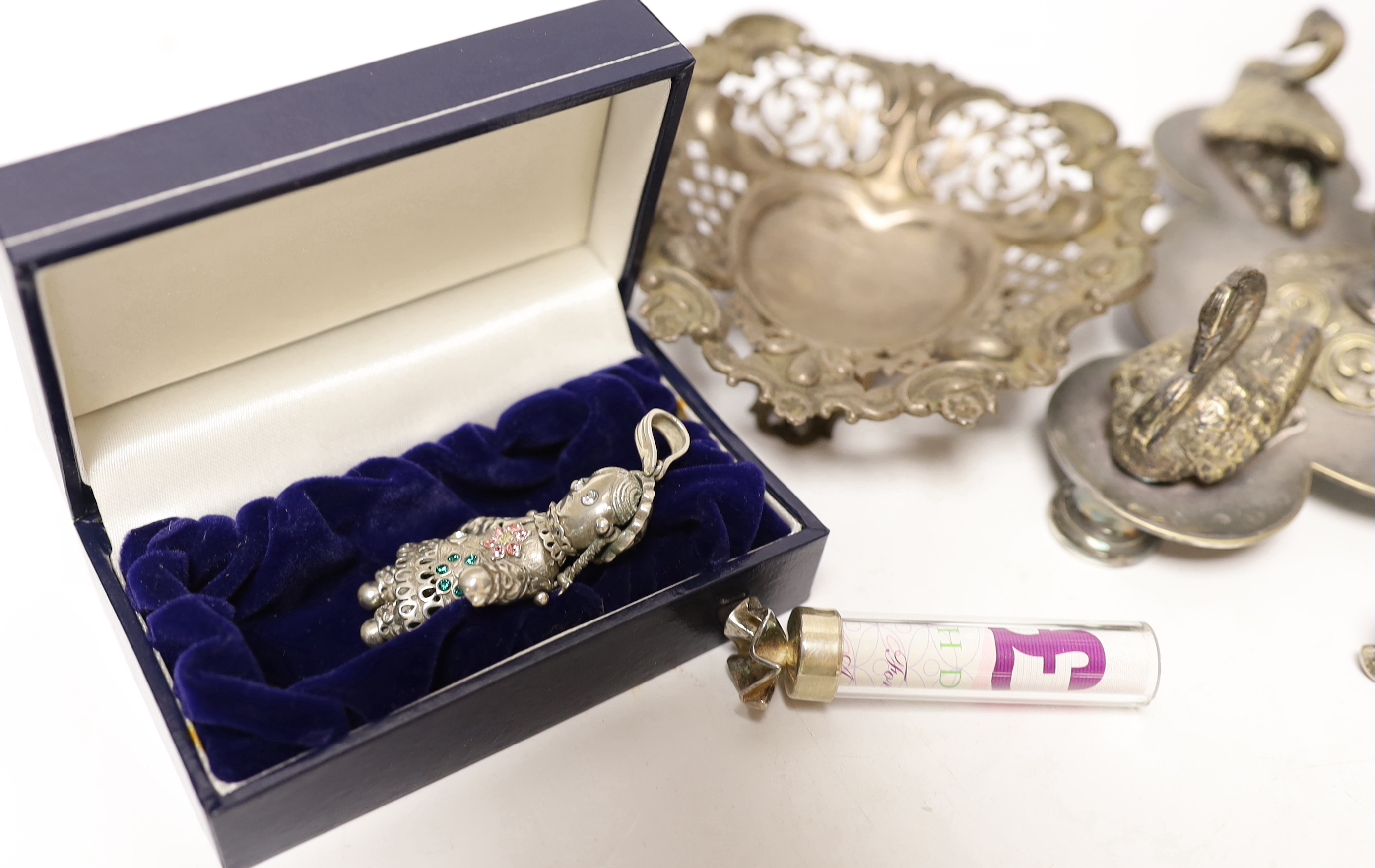 A pair of Edwardian pierced silver bonbon dishes, four other modern silver items and a plated centrepiece with glass vase.
